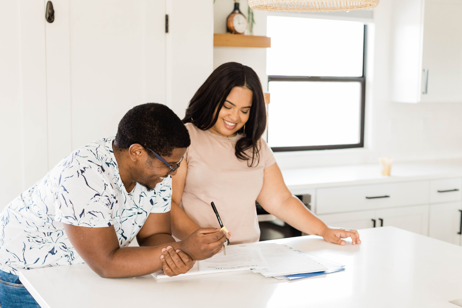 Two people doing paperwork